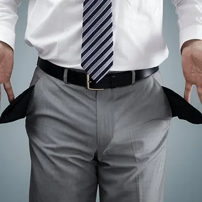 Image of man with empty pockets