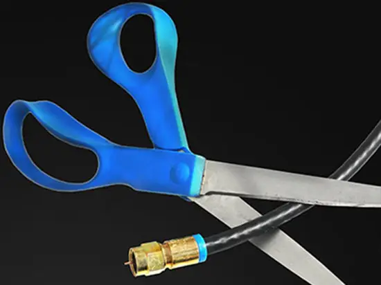 Image of cable wire being cut by scissors
