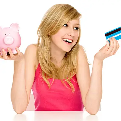 Image of teen holding a credit card