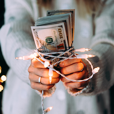 Image of woman holding many presents