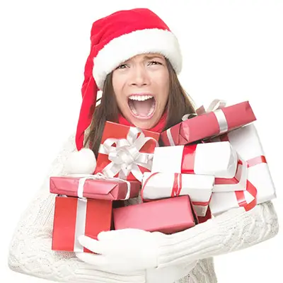 Image of woman holding many presents