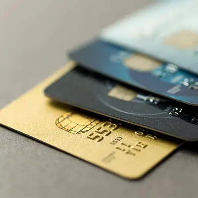Image of several credit cards on desk