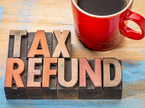 Image of a sign that says TAX REFUND