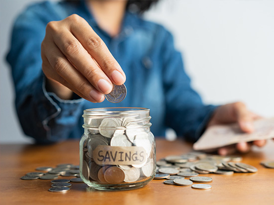 image of woman saving money