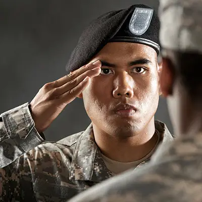 Image of serviceman saluting