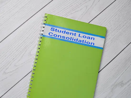 Image of notebook labeled STUDENT LOAN CONSOLIDATION