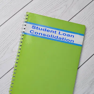 Image of student loan debt consolidation notebook