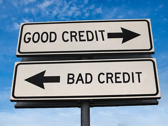 Image of opposing street signs labeled GOOD CREDIT and BAD CREDIT