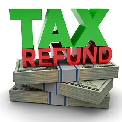 Image of TAX REFUND on top of money