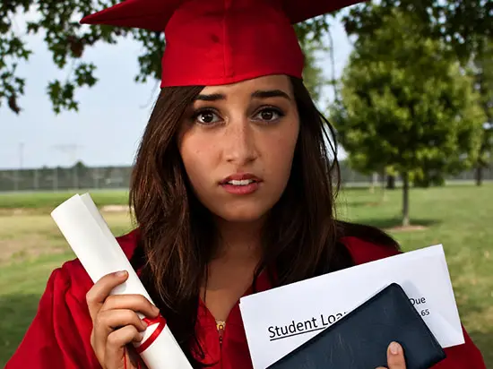 Image of college graduate holding diploma and student loan bill